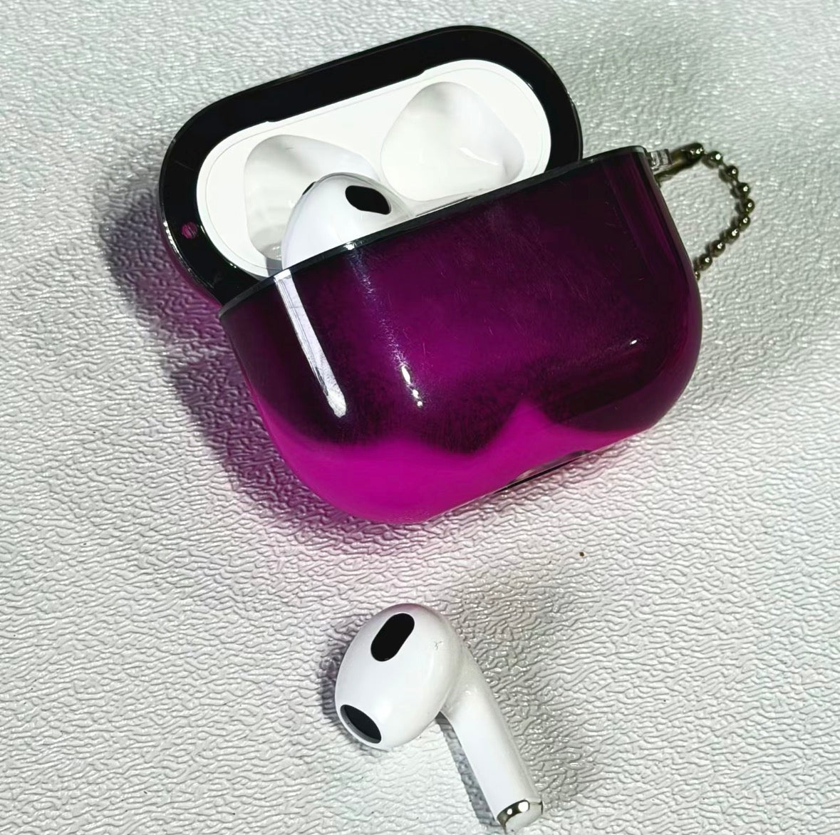 Luminous quicksand for AirPod case